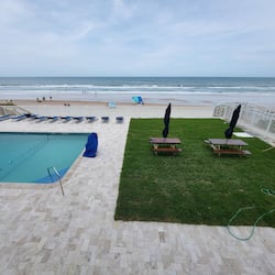 On the beach, white sand, beach towels