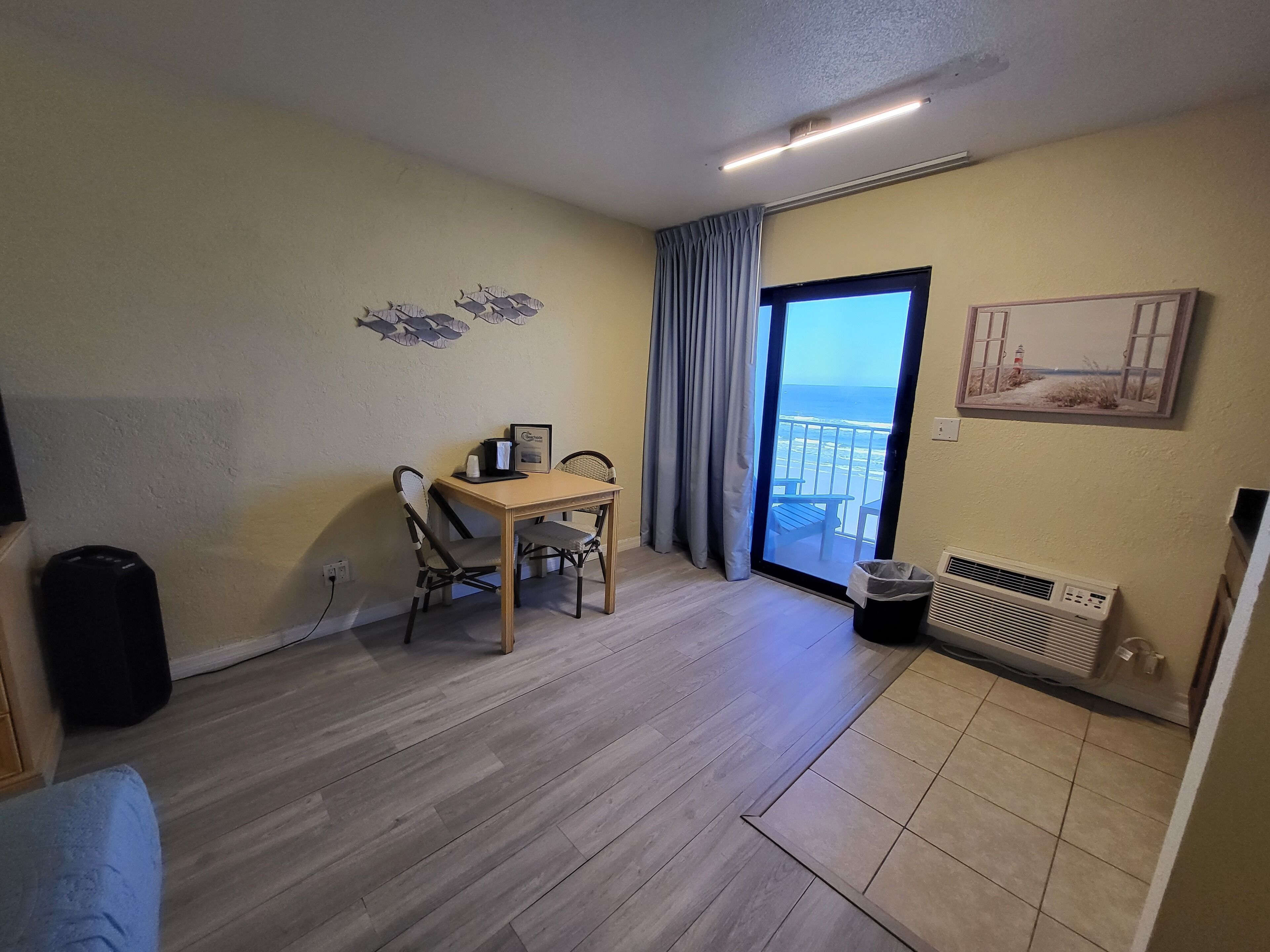 standard room, 1 king bed, kitchenette, oceanfront | living area | 50-inch led tv with cable channels, tv