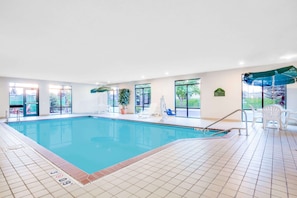 Indoor pool, open 7:00 AM to 10:00 PM, pool umbrellas, sun loungers