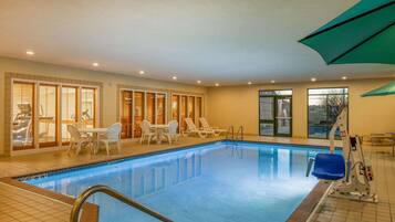 Indoor pool, open 7:00 AM to 10:00 PM, pool umbrellas, pool loungers
