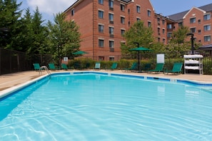 Seasonal outdoor pool, open 10 AM to 8 PM, pool loungers