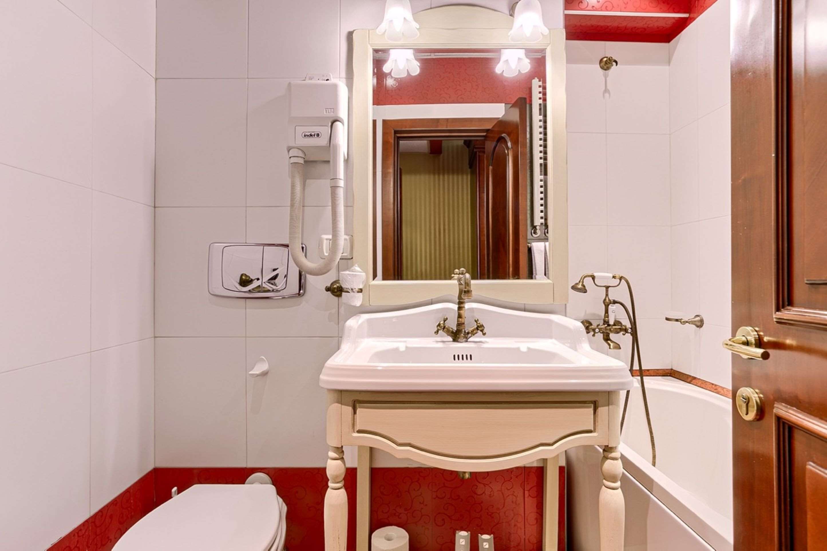 suite, 1 queen bed, non smoking, bathtub | bathroom | hair dryer, slippers, towels