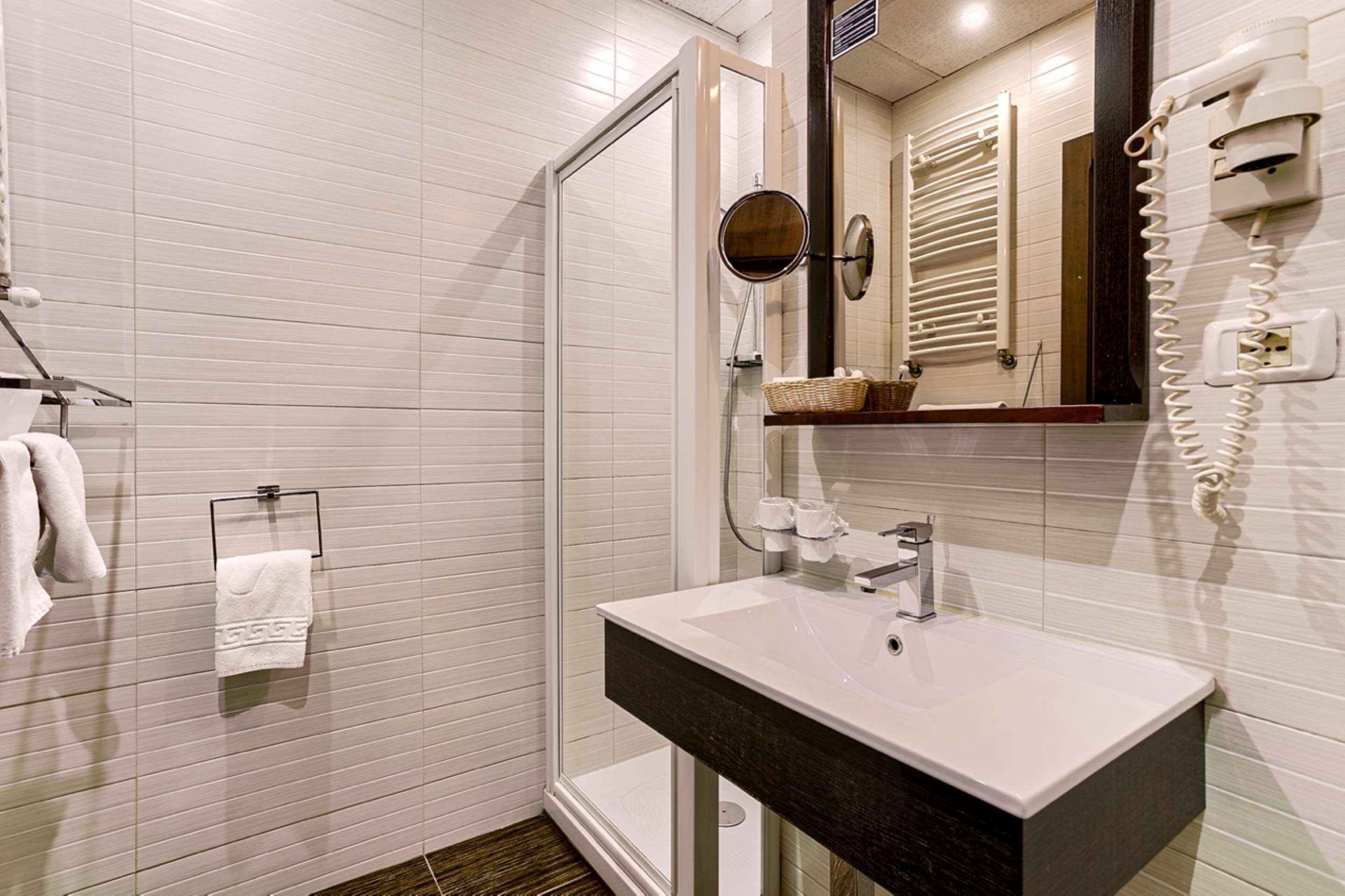 superior room, 1 queen bed, non smoking | bathroom | hair dryer, slippers, towels