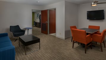 Suite, 1 King Bed with Sofa bed (Additional Living Area) | Desk, iron/ironing board, free cribs/infant beds, rollaway beds