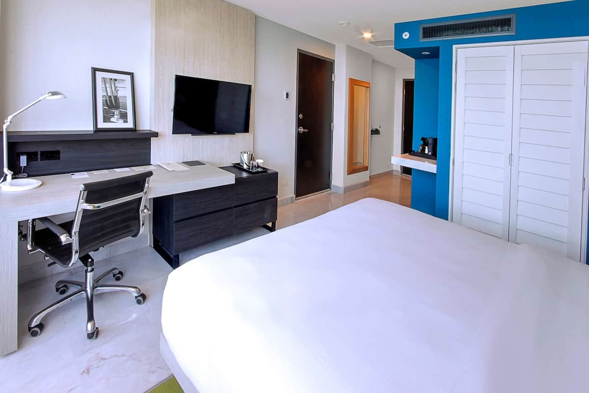Premium bedding, down duvets, pillow-top beds, in-room safe