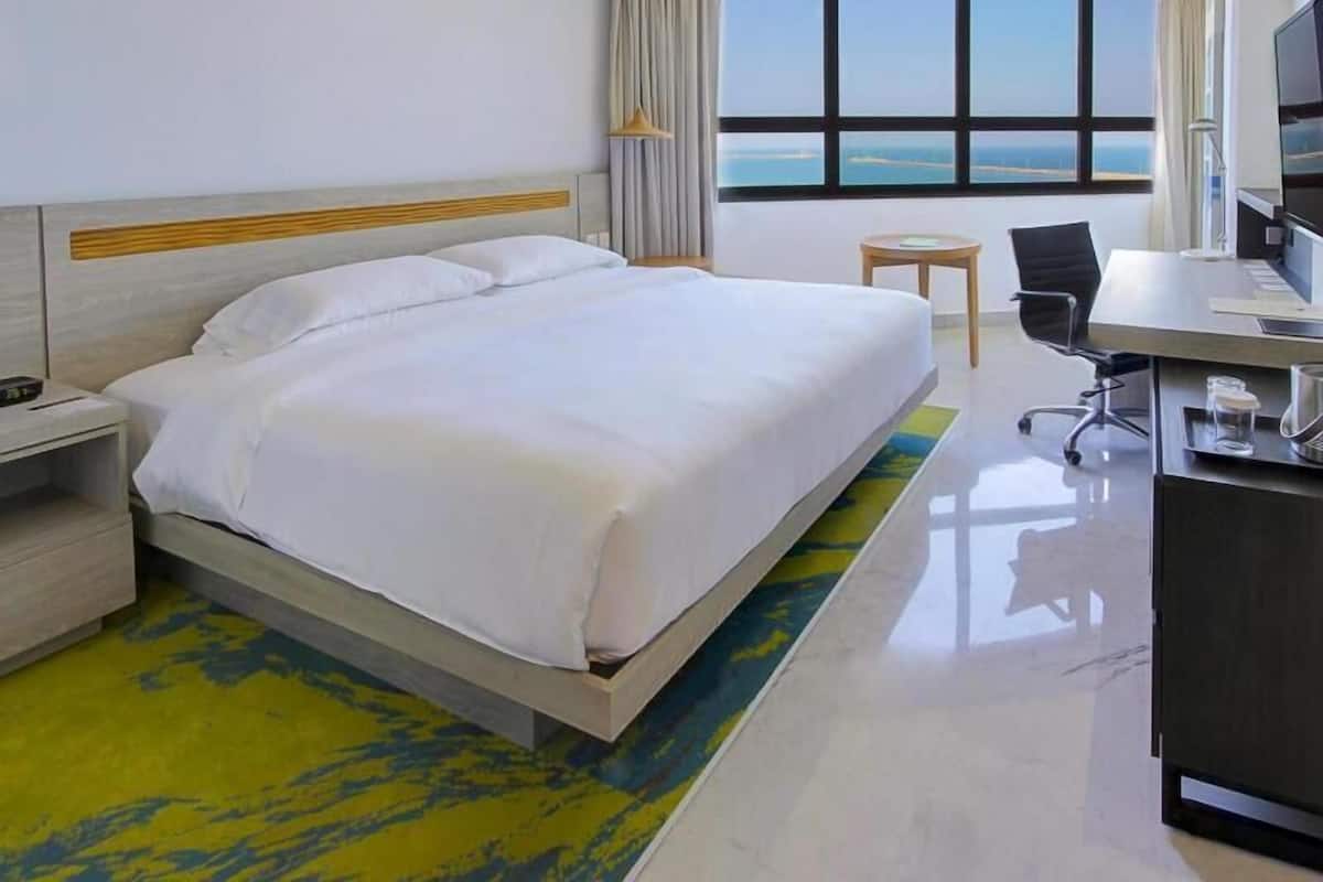 Literie de qualité, couette en duvet, lit avec matelas à plateau-coussin