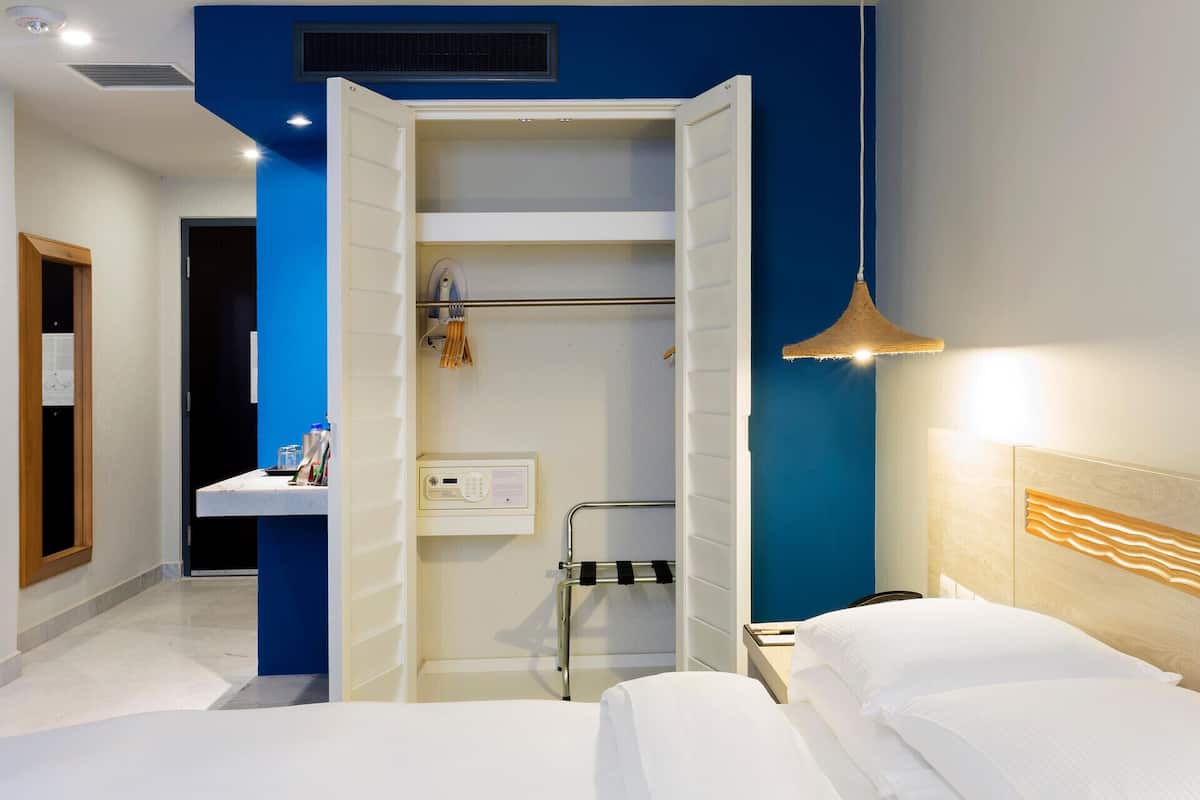 Premium bedding, down duvets, pillow-top beds, in-room safe