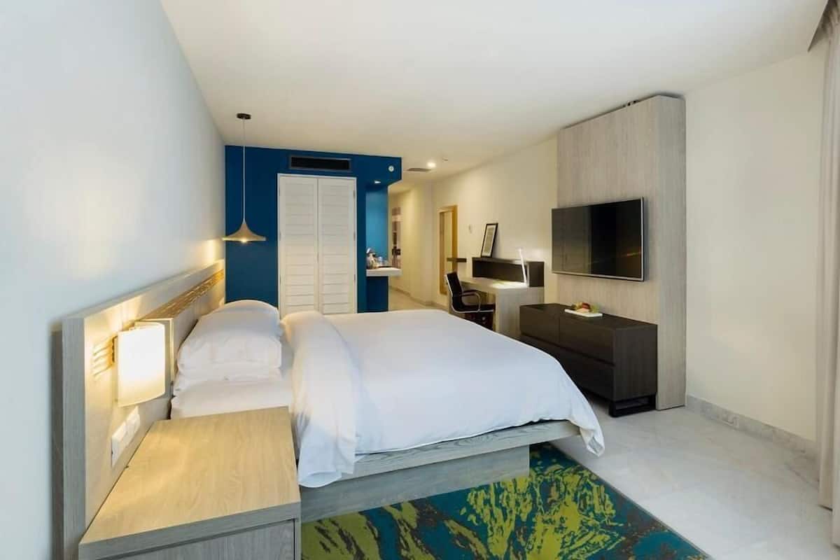 Premium bedding, down duvets, pillow-top beds, in-room safe