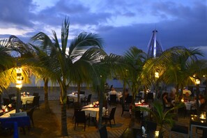 Breakfast, lunch, dinner served; beach views