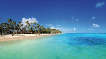 On the beach, sun loungers, beach towels, beach massages