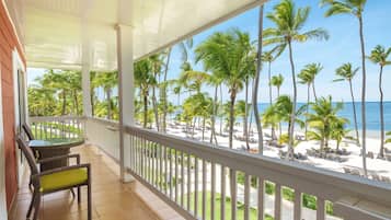 Premium Suite, Oceanfront (Level) | Pillow-top beds, minibar, in-room safe, desk