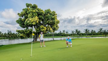 Enjoy a round of golf amidst lush greenery and scenic views.