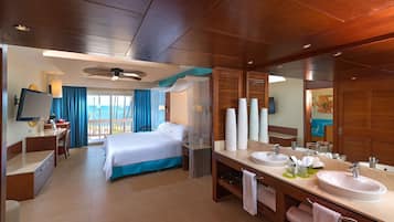 Premium Suite, Oceanfront (Level) | Bathroom | Combined shower/bathtub, free toiletries, hair dryer, dressing gowns