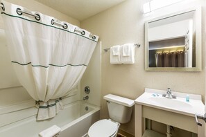 Combined shower/bathtub, towels, soap, shampoo