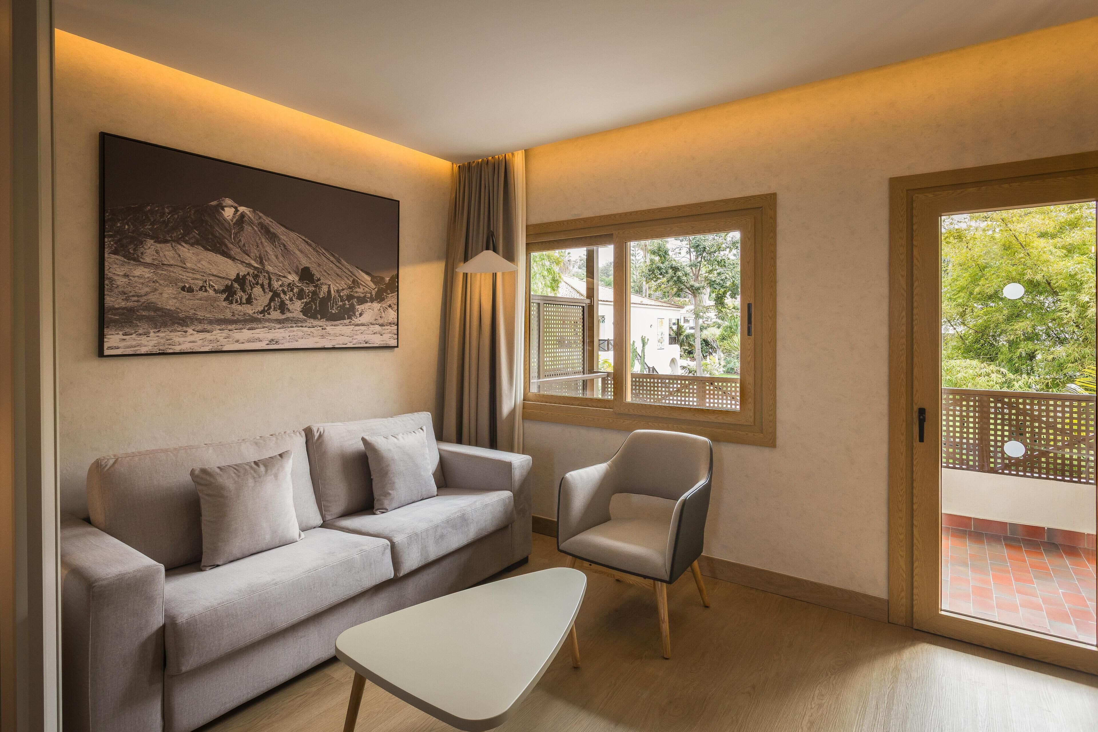 Junior Suite, Balcony | Minibar, in-room safe, desk, blackout drapes