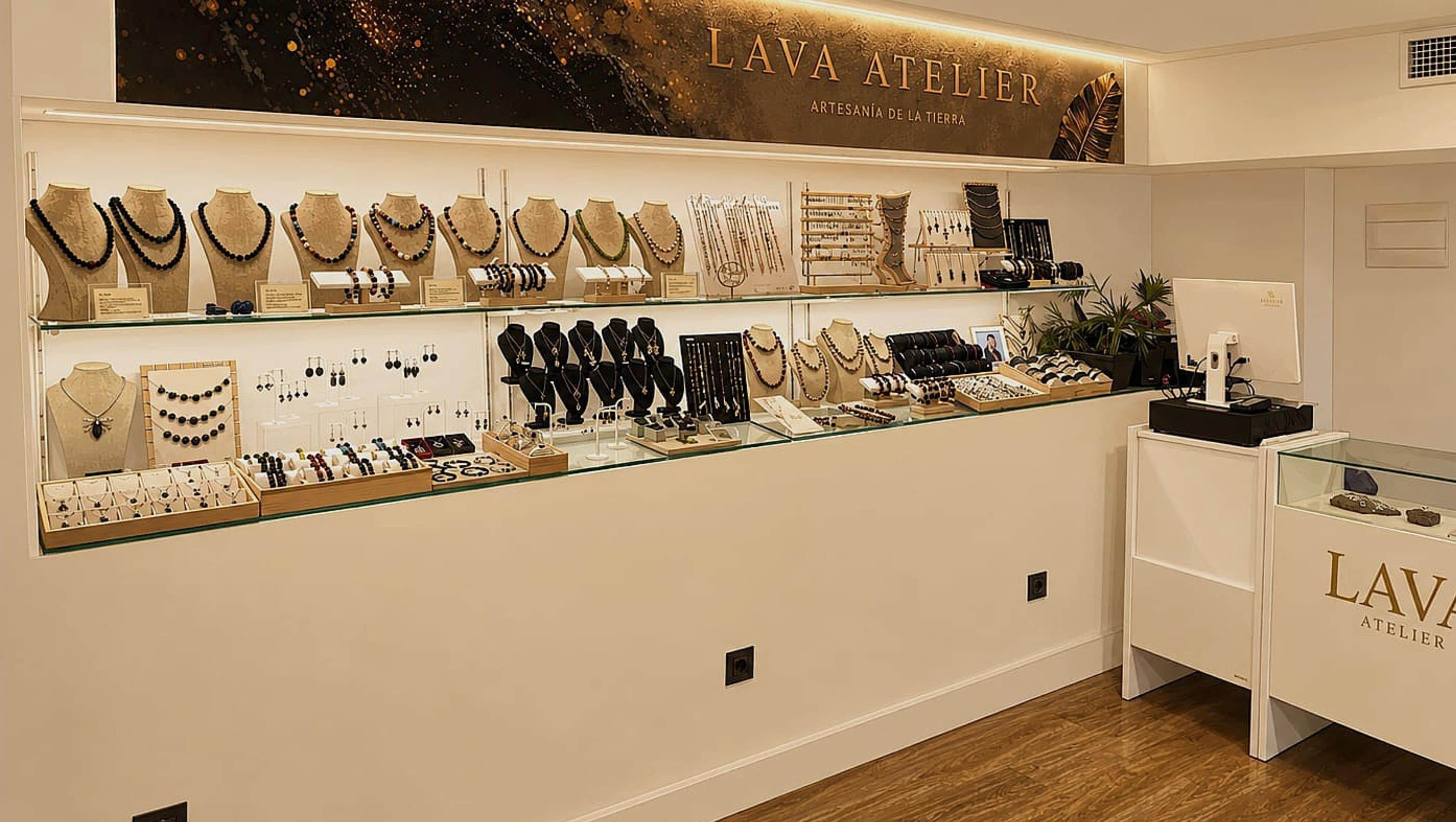 A jewelry store with various necklaces and earrings displayed on shelves.