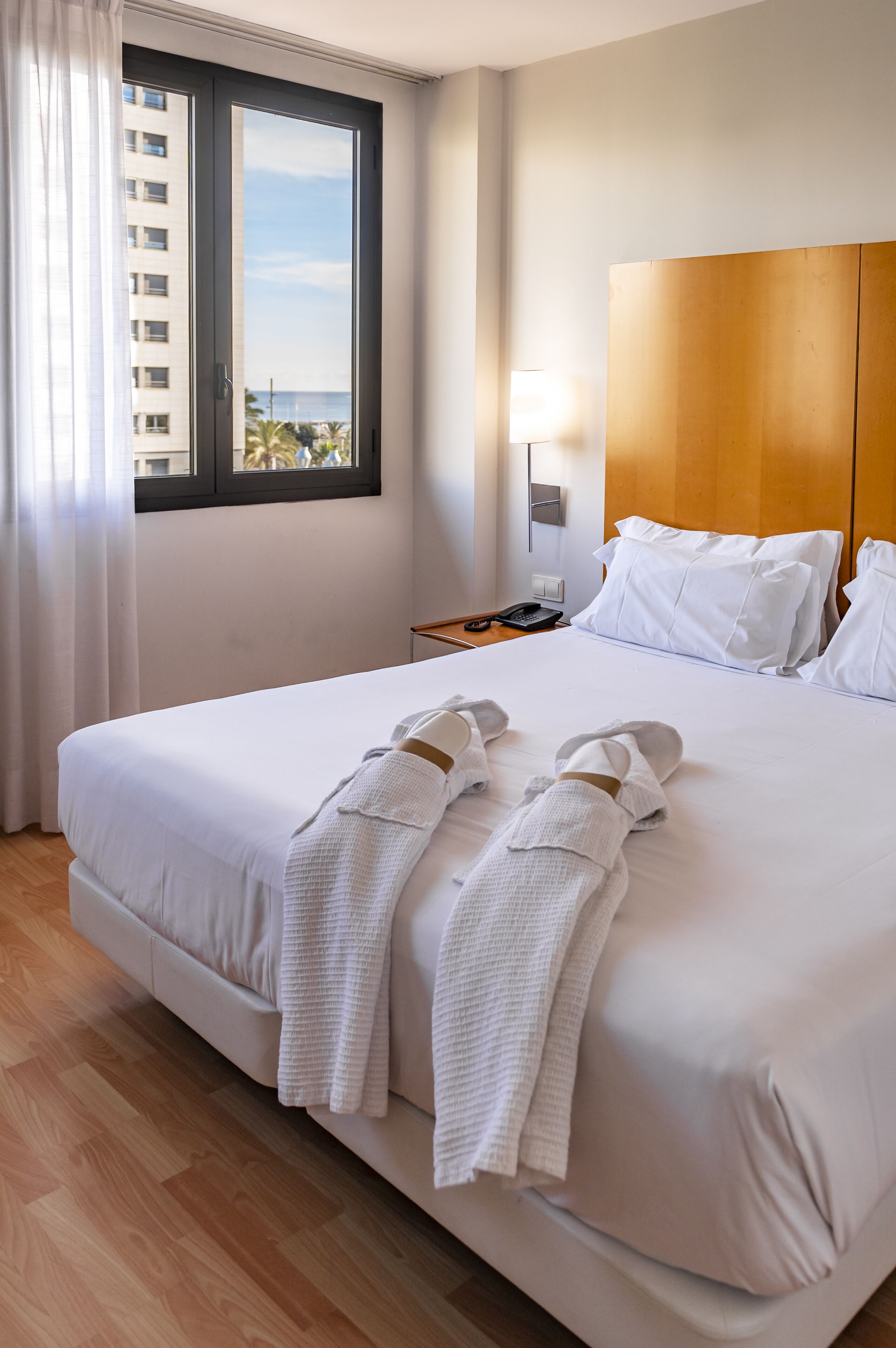 Comfort Room, Garden View | Minibar, in-room safe, desk, blackout drapes