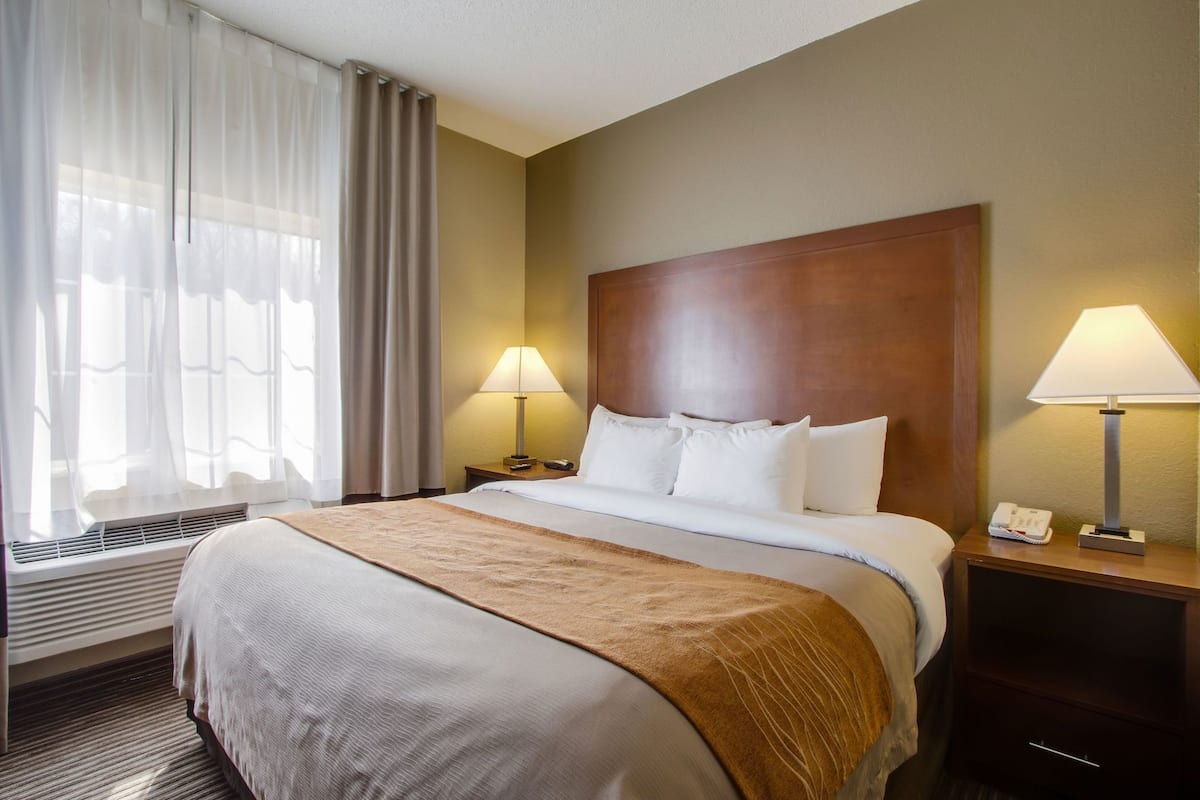Pillowtop beds, desk, blackout drapes, iron/ironing board