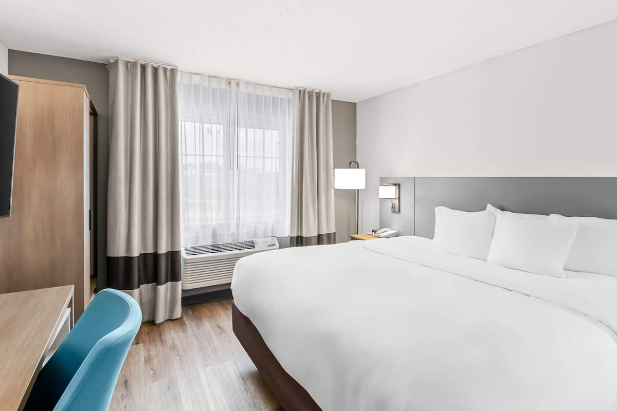 Pillow-top beds, desk, blackout curtains, iron/ironing board