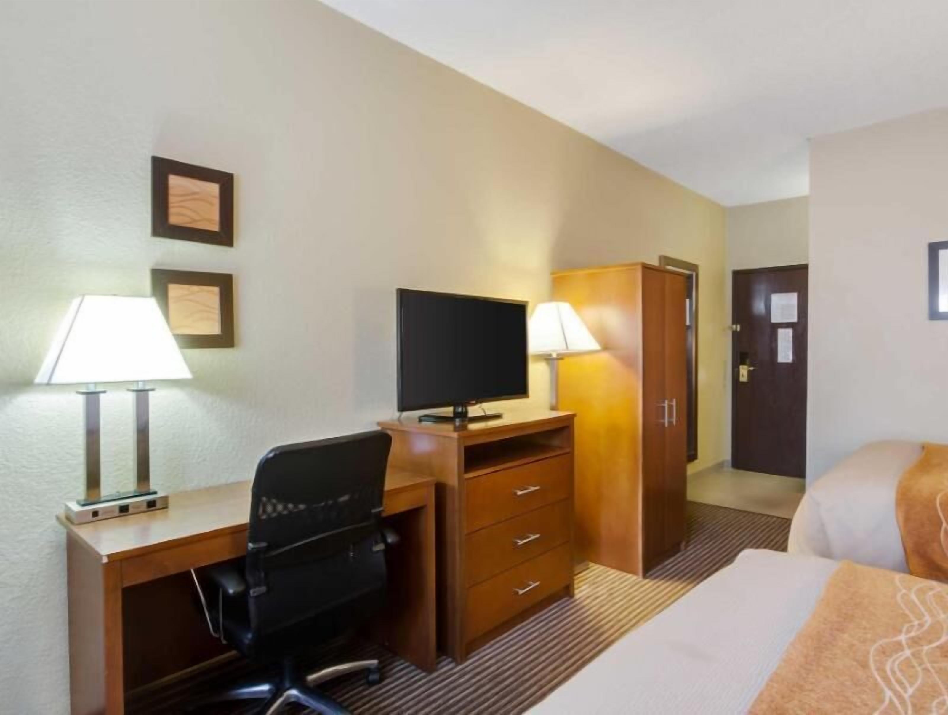 Pillowtop beds, desk, blackout drapes, iron/ironing board