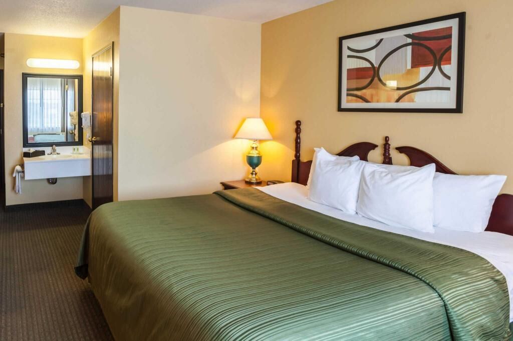 Pillow-top beds, desk, laptop workspace, blackout curtains