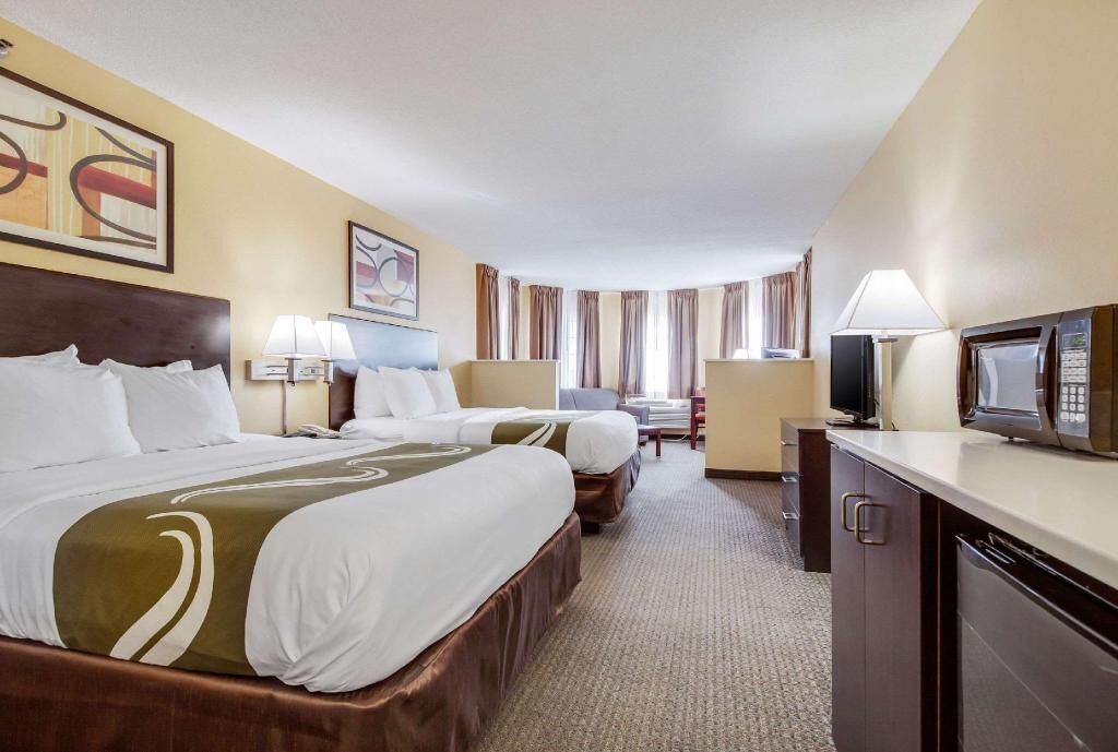 Pillow-top beds, desk, laptop workspace, blackout curtains