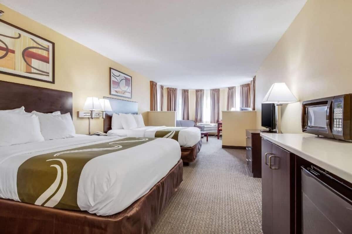 Pillow-top beds, desk, laptop workspace, blackout curtains