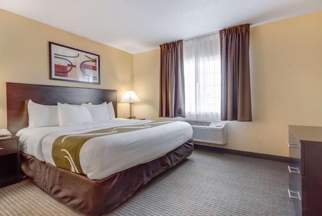 Pillow-top beds, desk, laptop workspace, blackout curtains