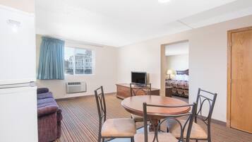 Suite, 1 King Bed with Sofa bed, Non Smoking | Living area | 32-inch TV with cable channels