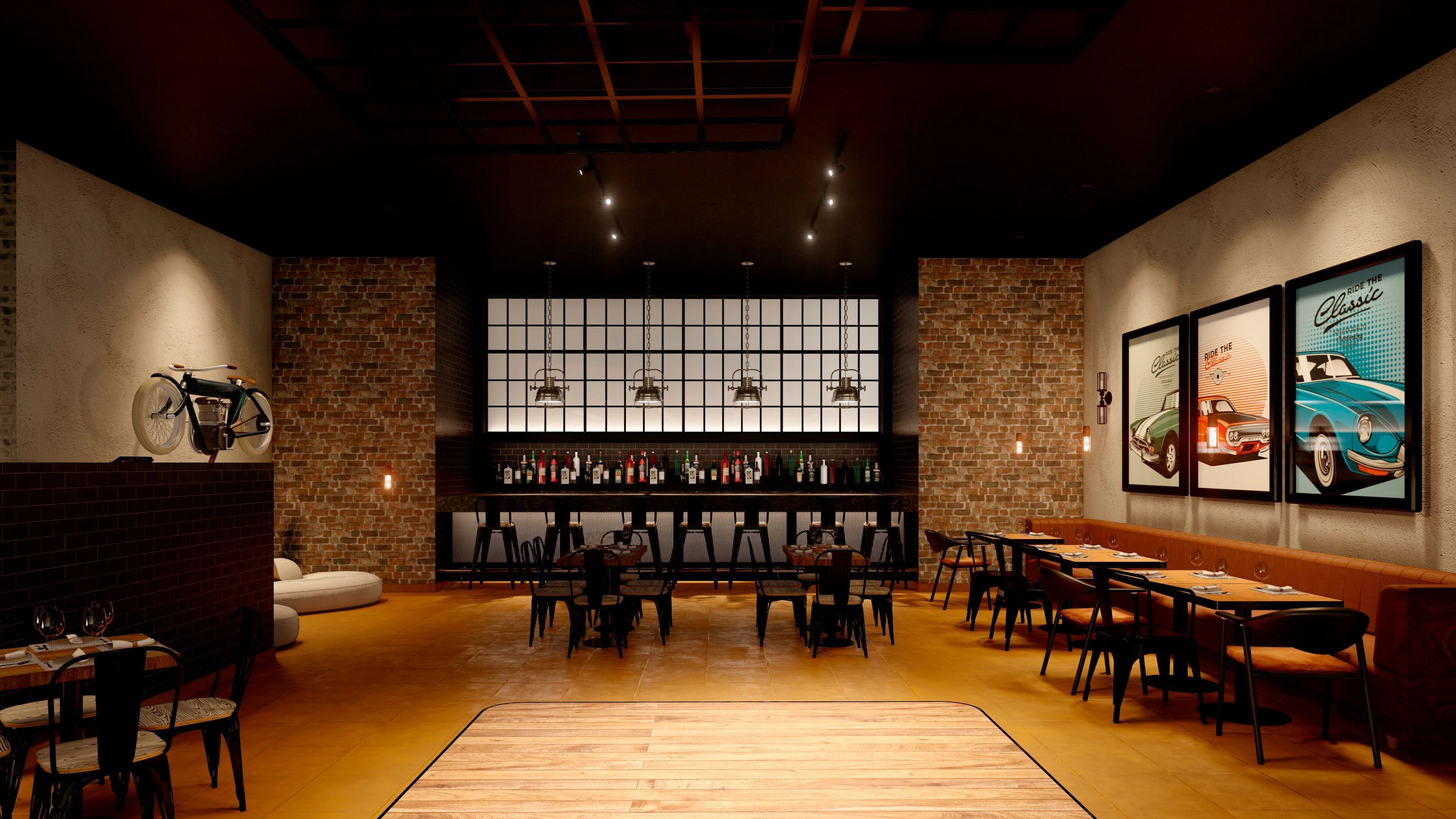 A restaurant with brick walls, wooden flooring, and a bar area with bottles and glasses.