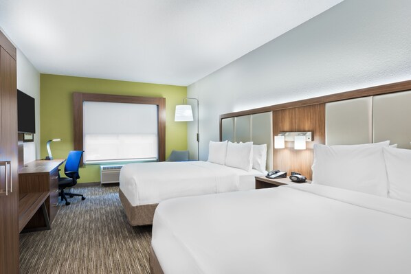 A hotel room with two beds, a desk, a chair, a lamp, and a TV. - Holiday Inn Express & Suites Columbus Airport East by IHG (Columbus)
