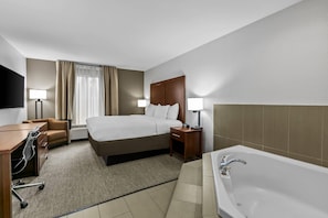 Standard Suite, 1 King Bed, Non Smoking, Jetted Tub (1 Person Jetted Tub) | Premium bedding, desk, soundproofing, iron/ironing board - Comfort Inn & Suites Greenwood near University (Greenwood)