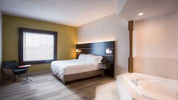 Suite, 1 King Bed, Jetted Tub (Additional Living Area) | Desk, iron/ironing board, free cribs/infant beds, rollaway beds