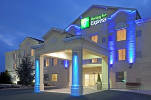 A Holiday Inn Express building with a covered entrance, large windows, and a prominent sign. - Holiday Inn Express & Suites Reading by IHG (Reading)