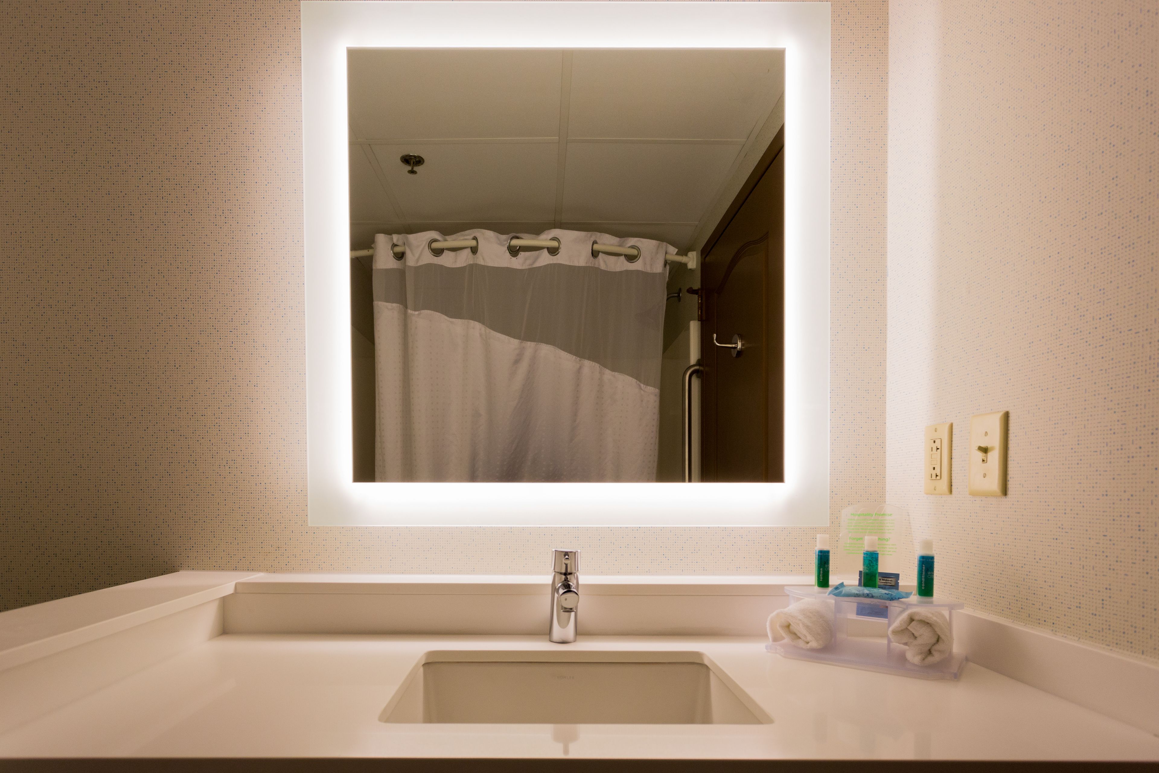 combined shower/bathtub, free toiletries, hair dryer, towels