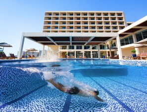 2 outdoor pools, open 7:00 AM to 9:00 PM, free cabanas, pool umbrellas