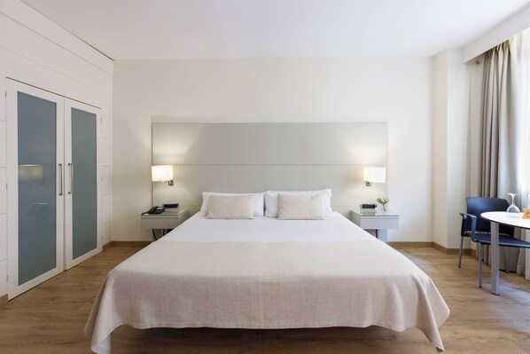 Minibar, in-room safe, blackout curtains, iron/ironing board