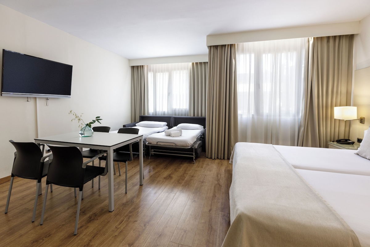 Apartment (4 Adults) | Minibar, in-room safe, blackout curtains, iron/ironing board