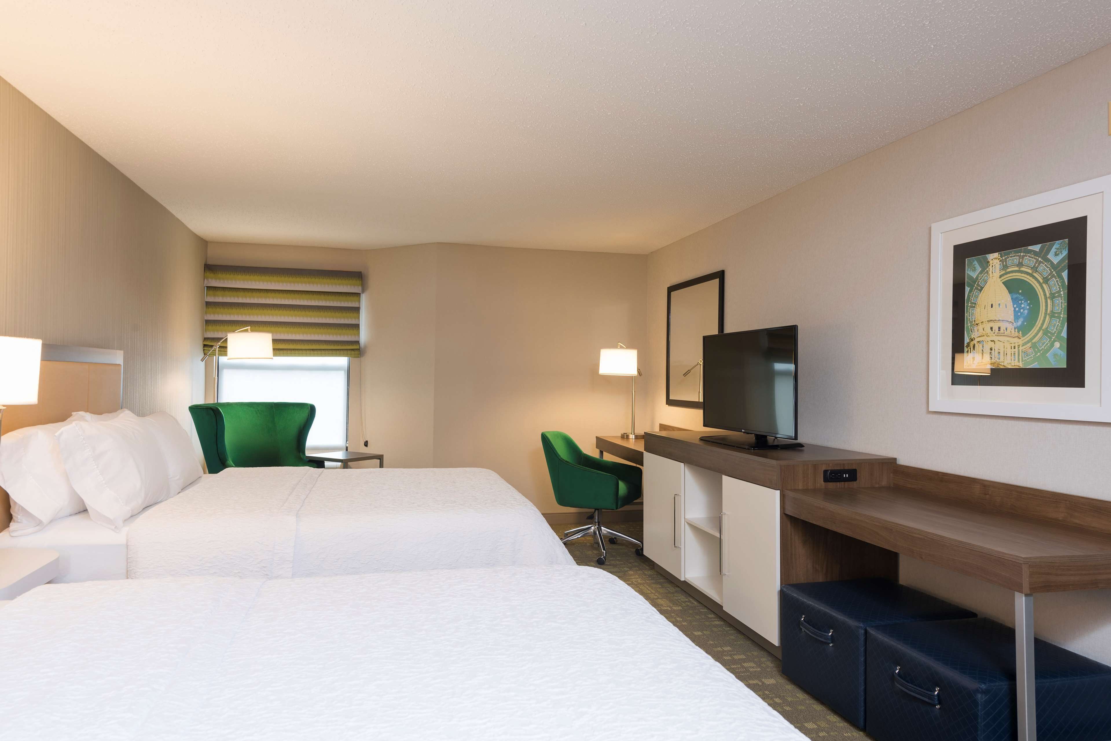 suite, 2 queen beds, refrigerator & microwave (wet bar) | in-room safe, laptop workspace, iron/ironing board, free wifi