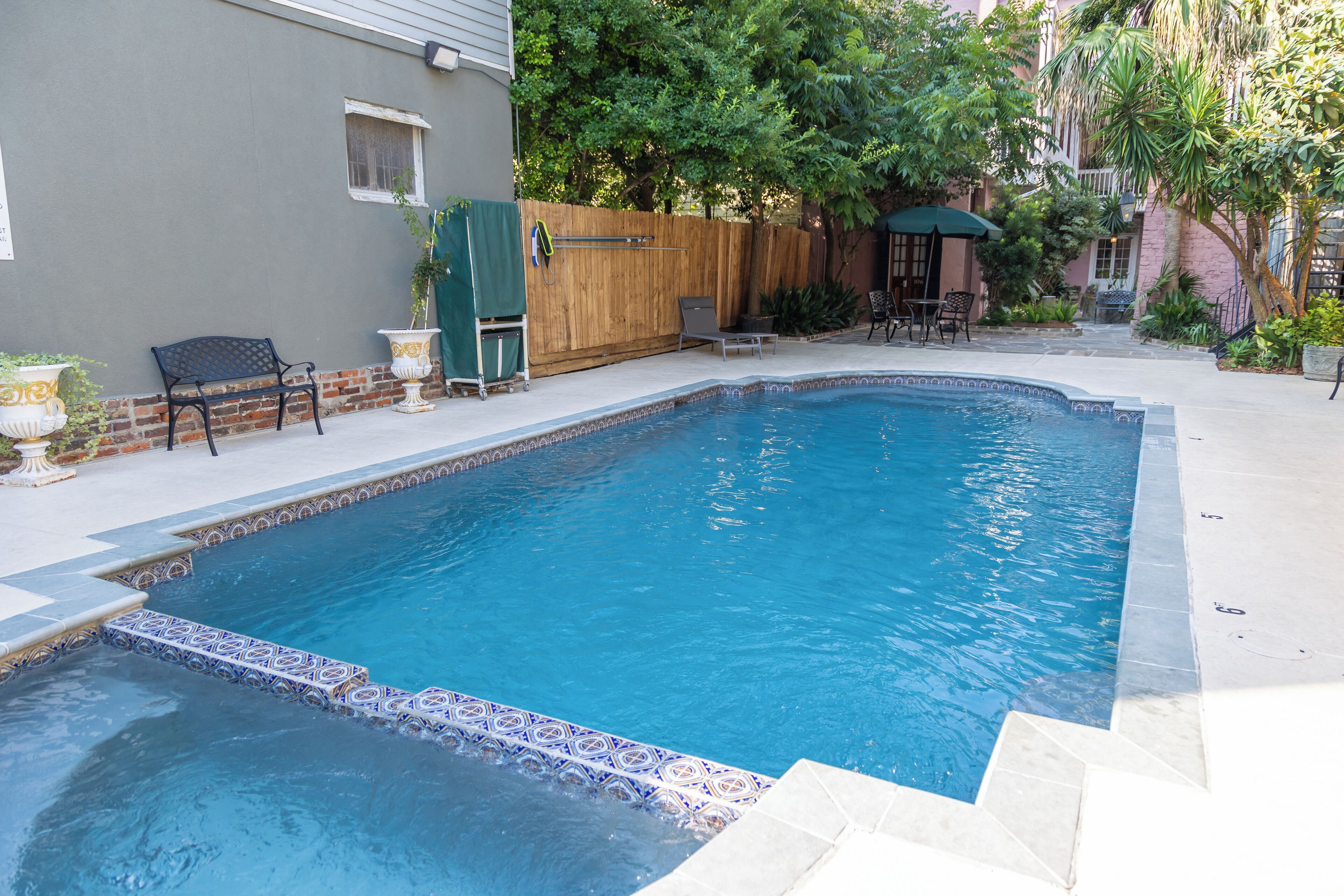 seasonal outdoor pool, open 8:00 am to 11:00 pm, pool umbrellas