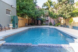 Seasonal outdoor pool, open 8:00 AM to 11:00 PM, pool umbrellas
