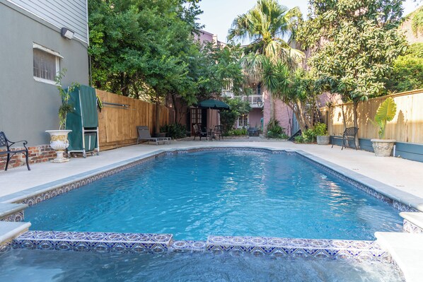 Seasonal outdoor pool, open 8:00 AM to 11:00 PM, pool umbrellas
