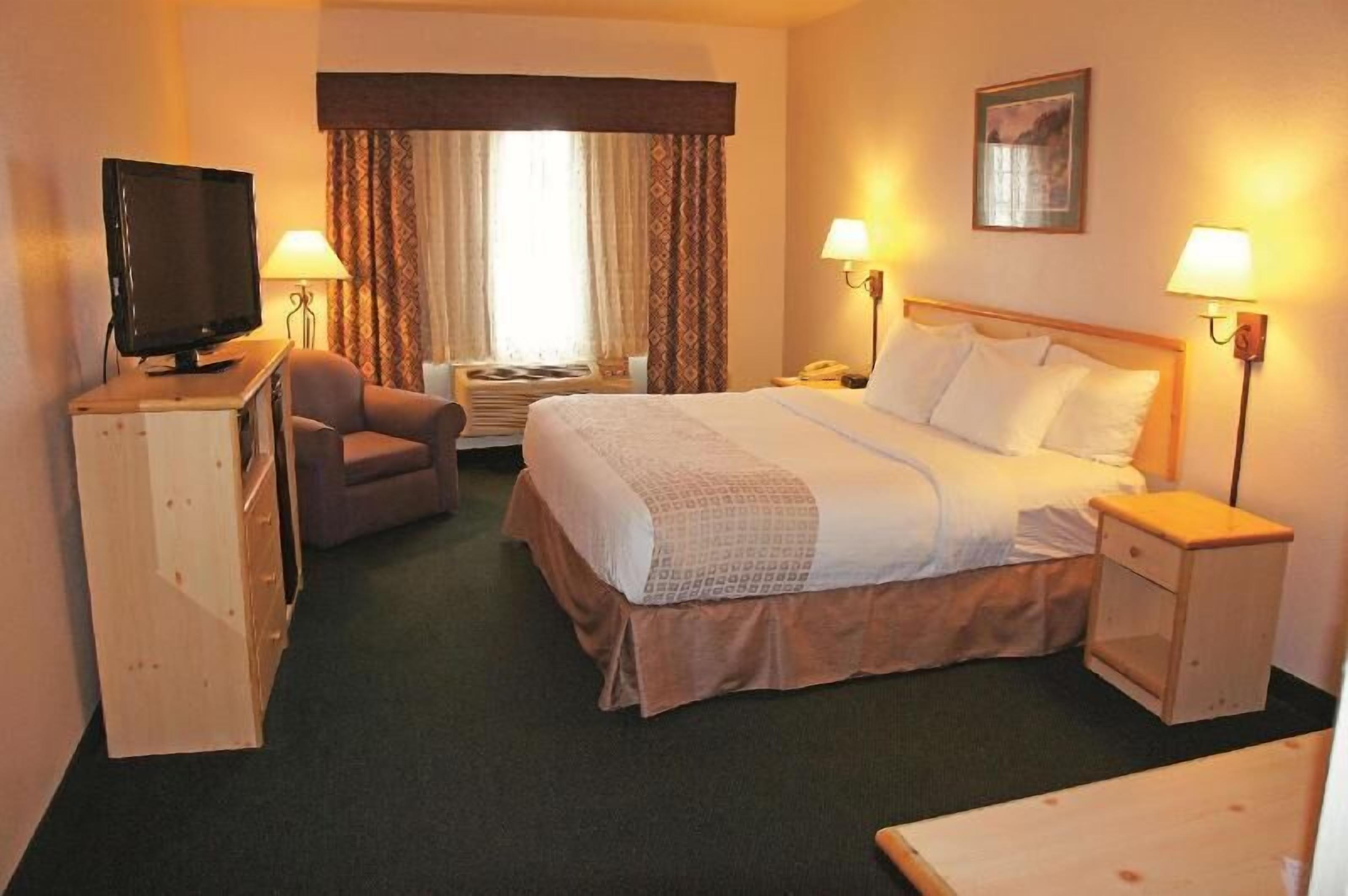 Premium bedding, pillow-top beds, desk, blackout curtains