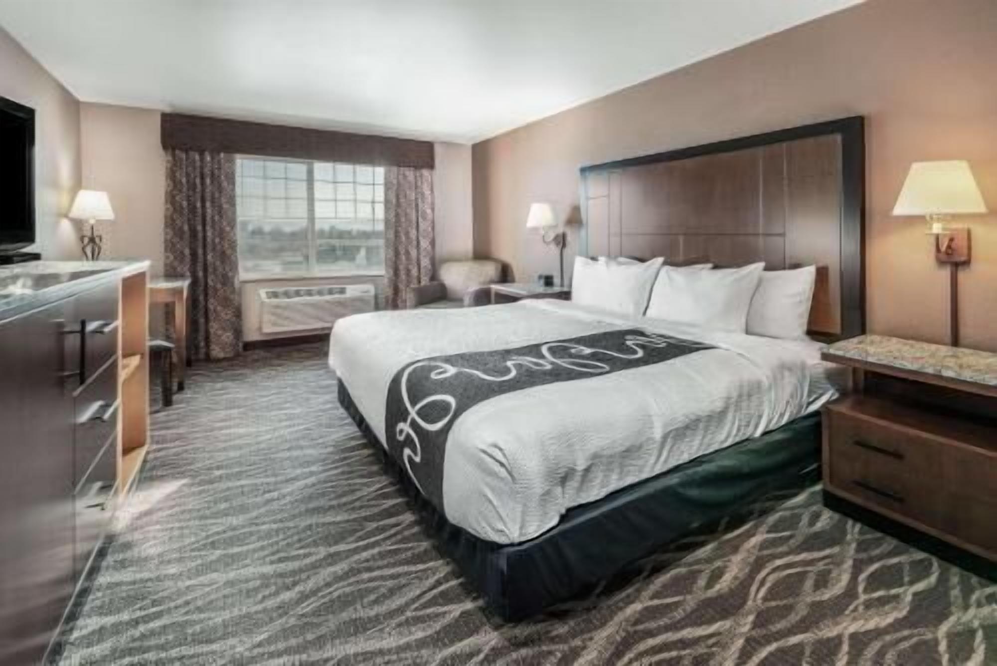 Premium bedding, pillow-top beds, desk, blackout curtains