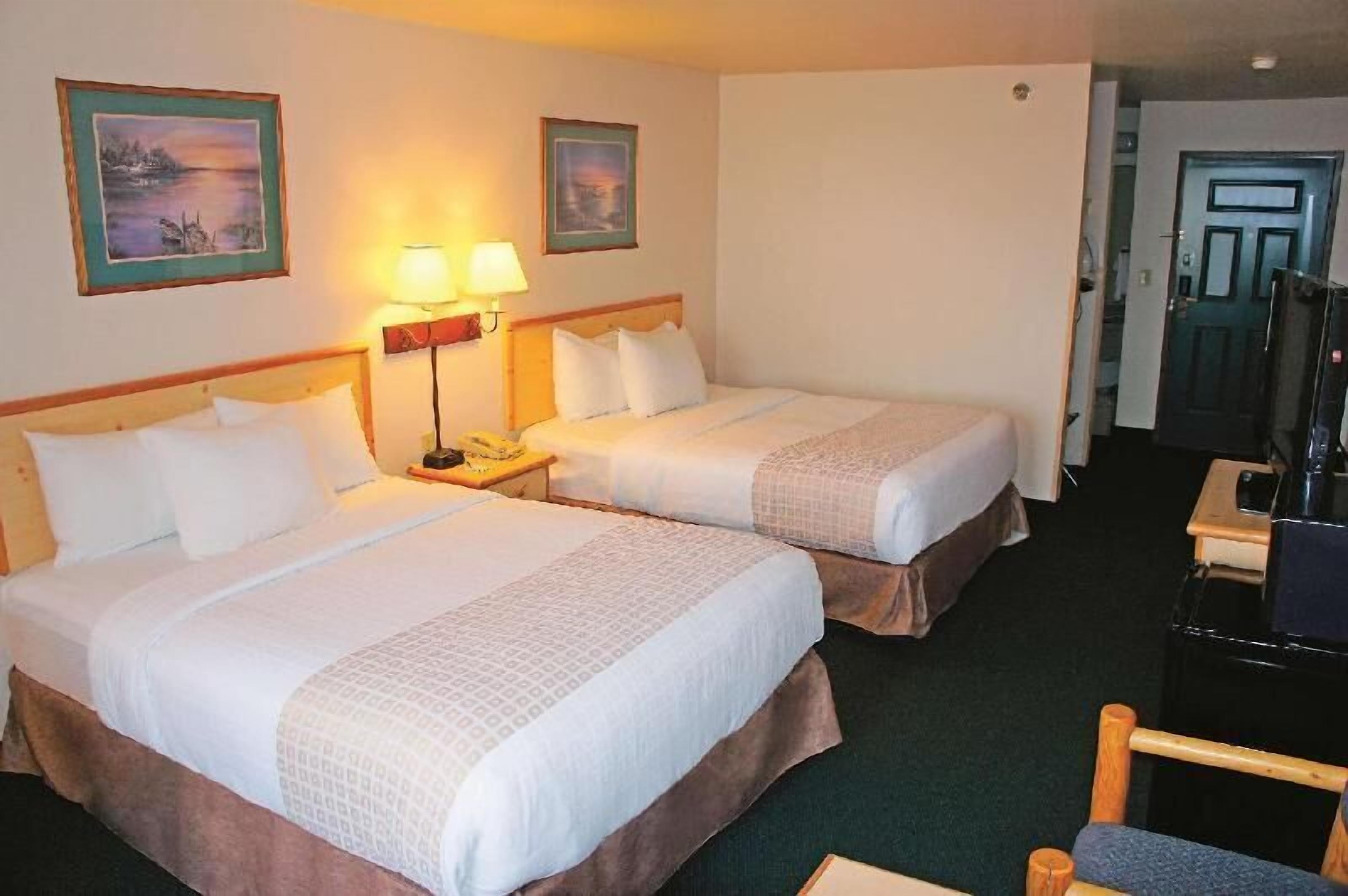 Premium bedding, pillow-top beds, desk, blackout curtains