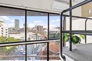 Appartement Exécutif, cuisine, vue port | Vue de la chambre