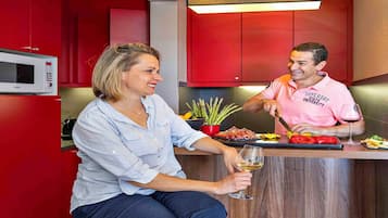 Enjoy a meal at the kitchen counter with a glass of wine.