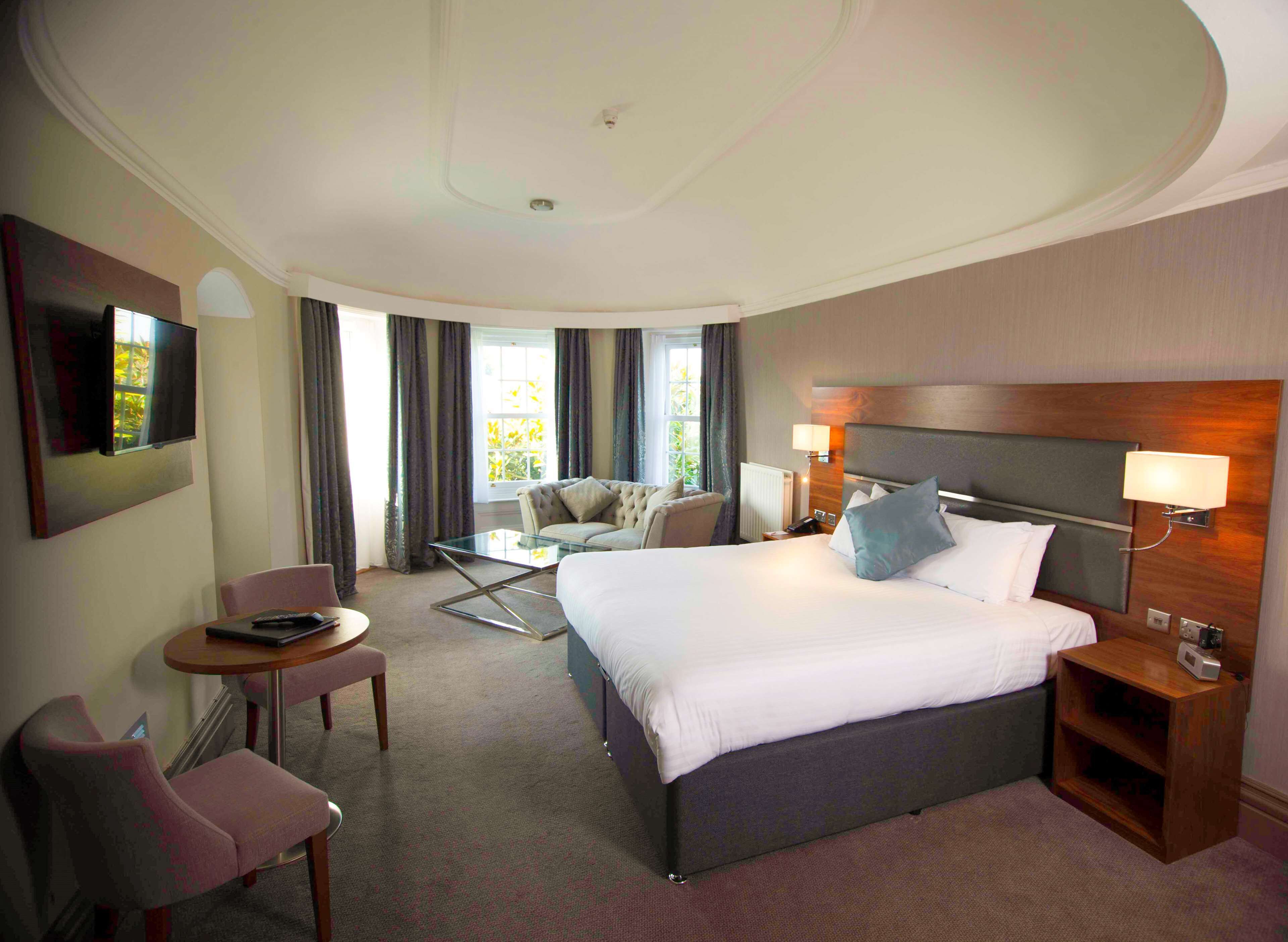 suite, 1 king bed, non smoking | desk, laptop workspace, iron/ironing board, free wifi