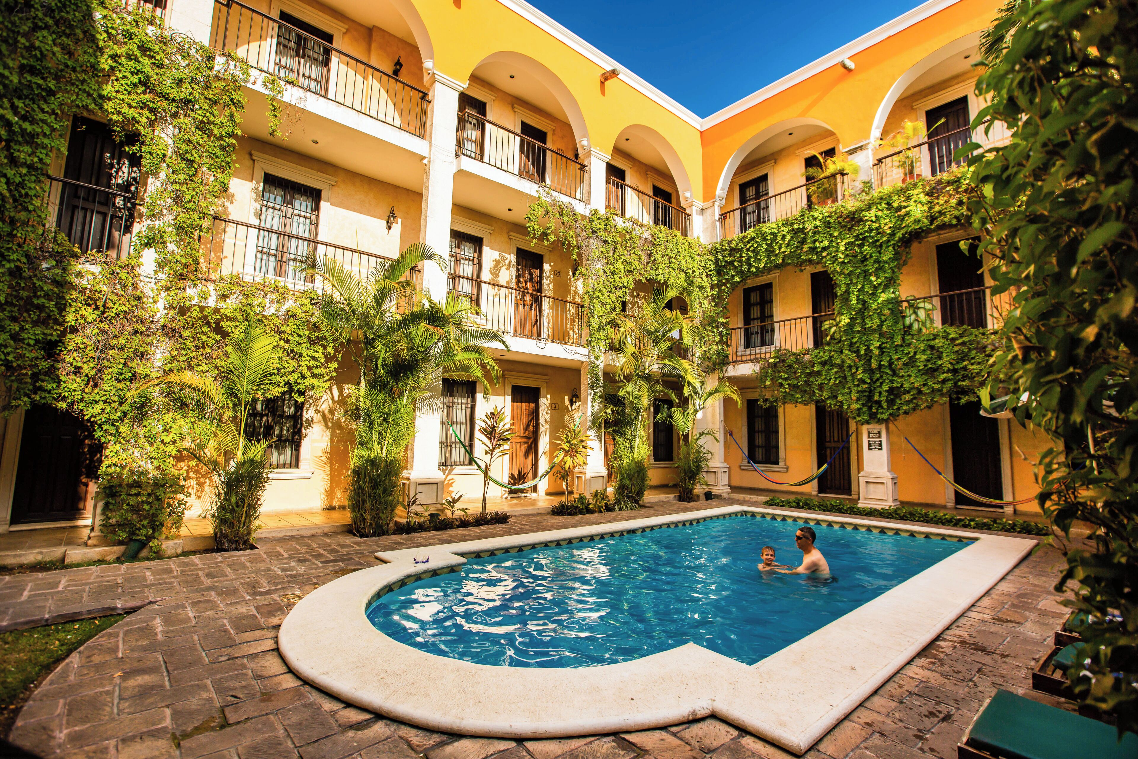 outdoor pool, open 8 am to 8 pm, pool loungers