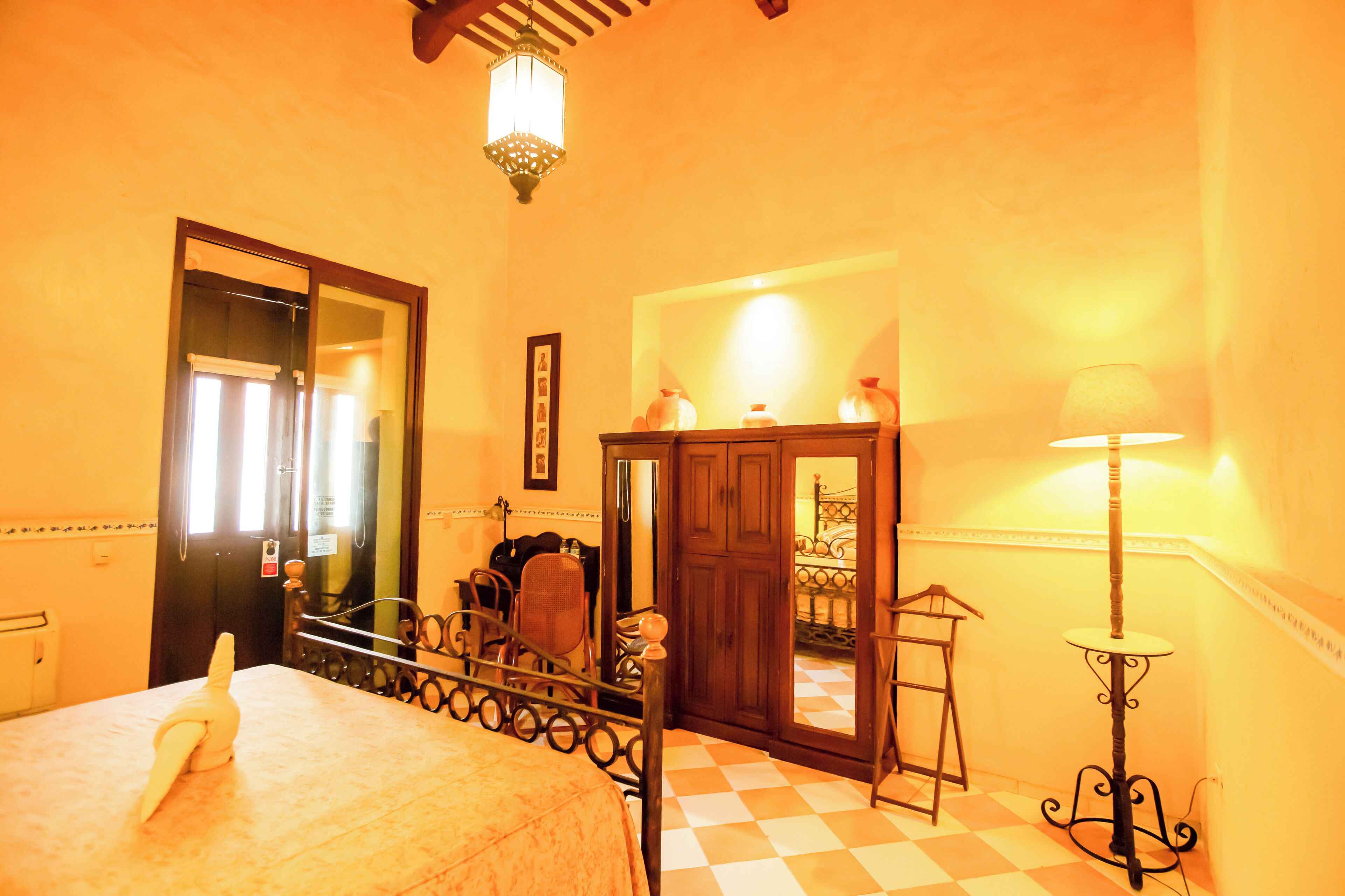 deluxe suite 1 double bed & garden view | 1 bedroom, in-room safe, individually decorated, individually furnished